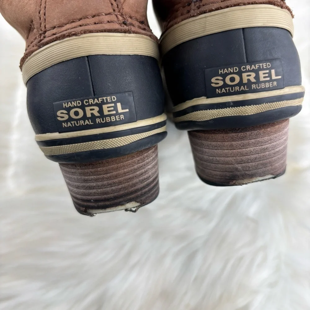 Sorel Tan and Black Lace-Up Boots